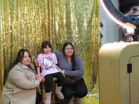 Family Taking a picture in the photo booth