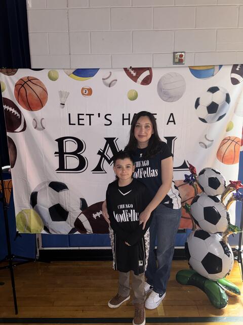 Mom with banner and son