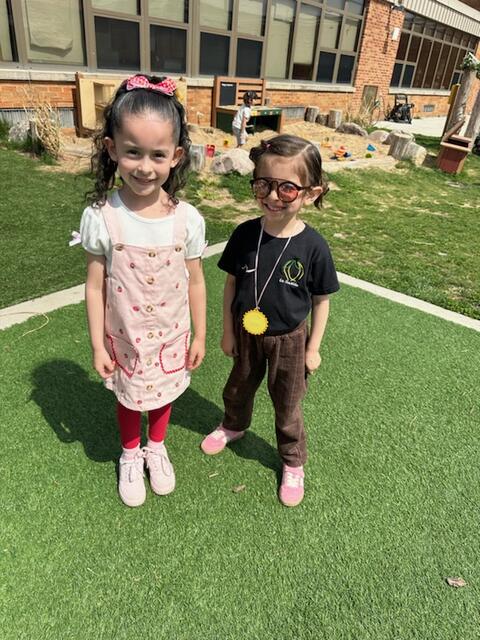 Two girls smiling on the playground