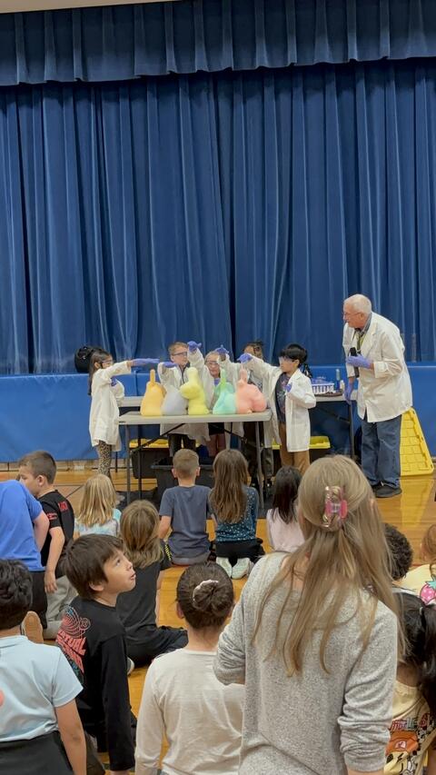5 scientists and Professor Rick