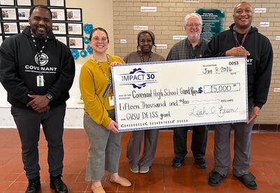 image of staff receiving the grant award