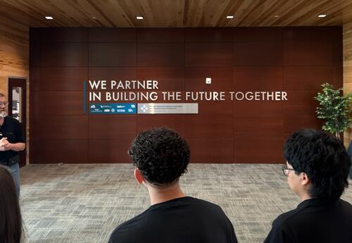 field trip graphic of a wall with a saying
