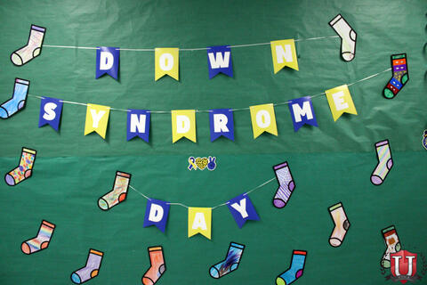Down Syndrome creatively designed with socks and string