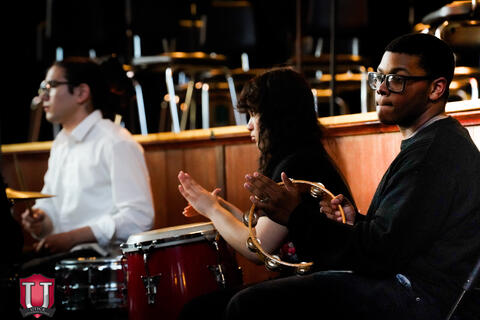 Students playing percussion intruments