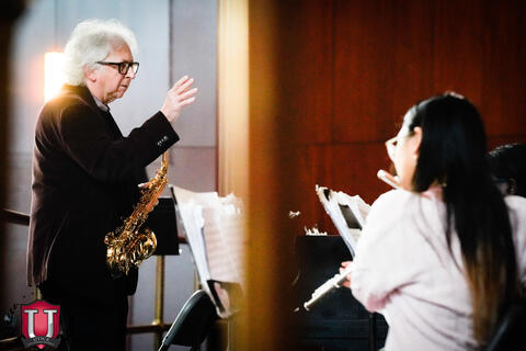 Conductor instructing the band