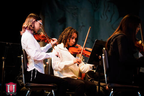 Students playing the violin