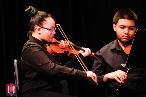 Student playing the violin