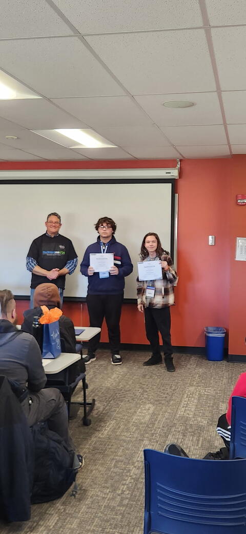 Student celebrating award