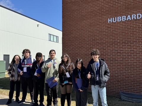 Students happily posing outside of the CTE Wing