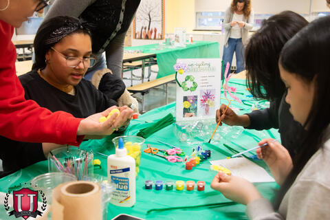 Student working on project happy