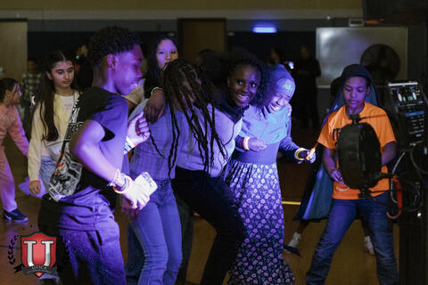 Group of students dancing hard