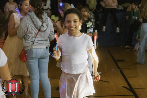 Student looks at camera happy