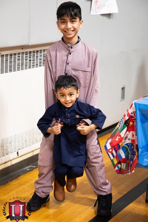 Student in the arms of a older student