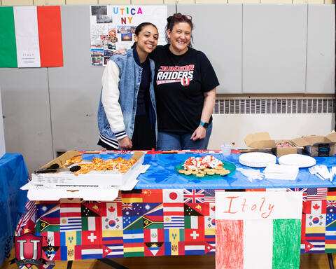 Staff poses together happily