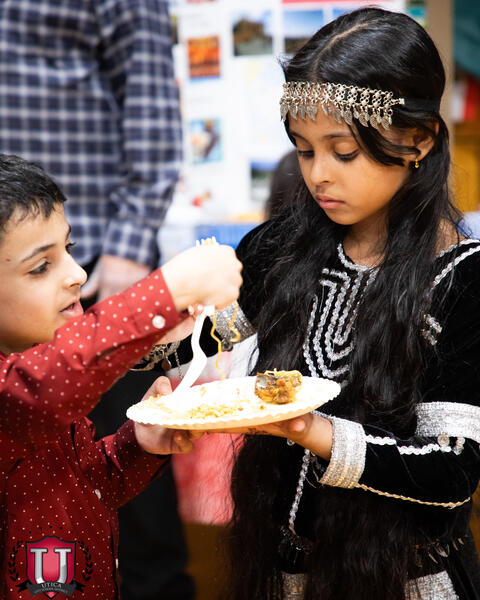 Students eating and enjoying some of the food