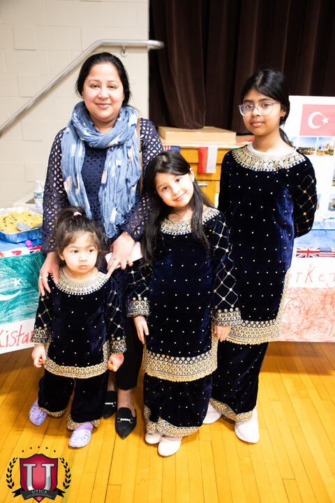 Students posing together with pride