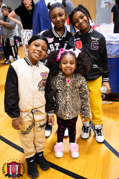 Two students posing together happily