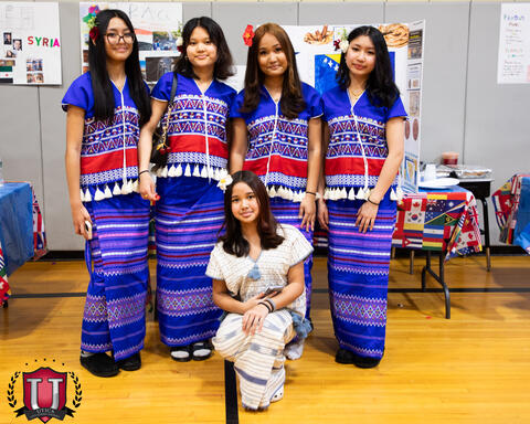 Dance team posing together post dance
