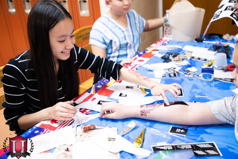 Students working on table display