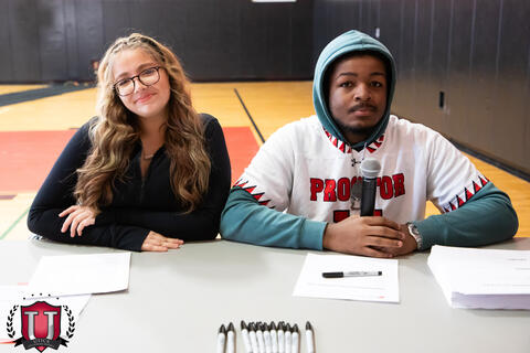 Two Students waiting for the athletes to arrive