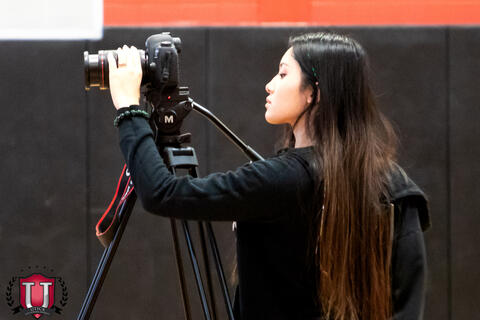 CTE Student prepping their camera to take photos