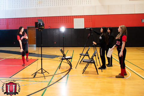 Student posing goofily on set