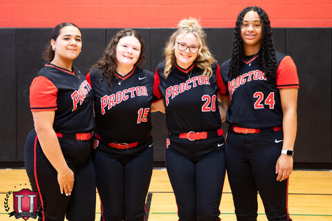 Four students posing together