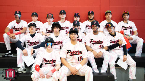 The baseball team posing together