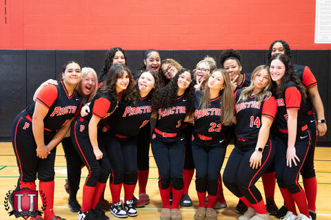 Softball girls posing together