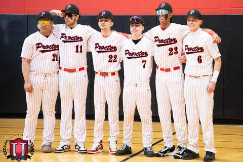 Small group of baseball boys together