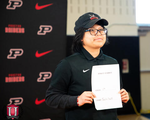 Tennis student posing with their bio