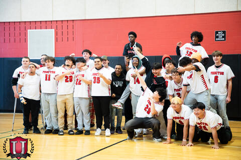 Mens lacrosse team posing sillily