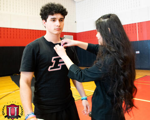 Track student being mic'd up by a cte student