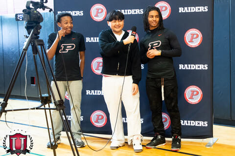 Students laughing on the set