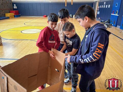 Students working on their boxes meticulously 