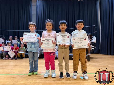 Students posing with their awards