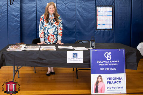 Banker posing with the banker career table