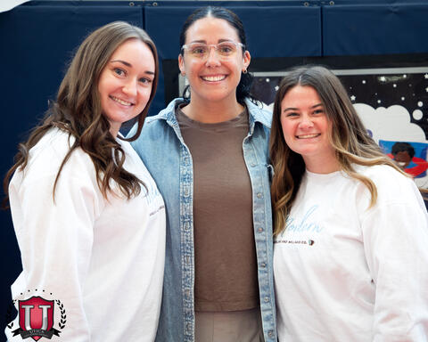 Three staff posing together