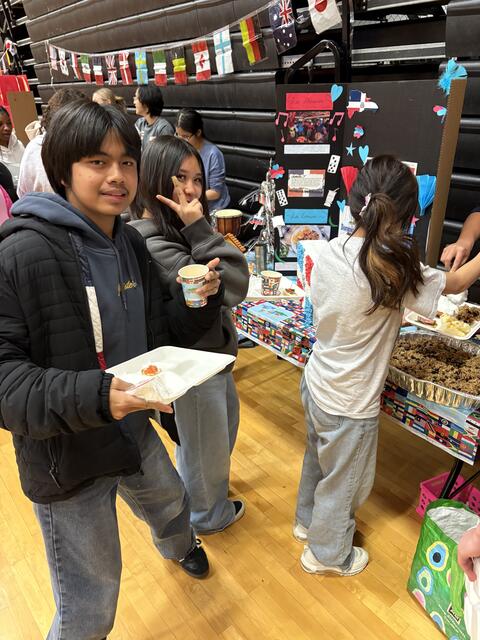 Students posing on multi-cultrual night