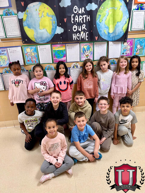 Group photo of students posing for earth day