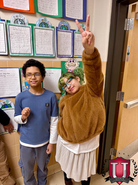 Student with a dramatic peace sign