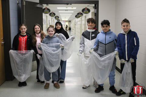 Students with trash bags prepping to big up trash