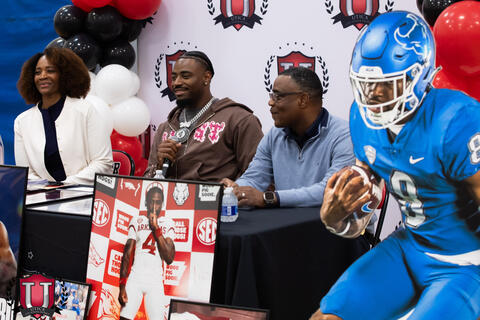Mike talking to the crowd on his microphone