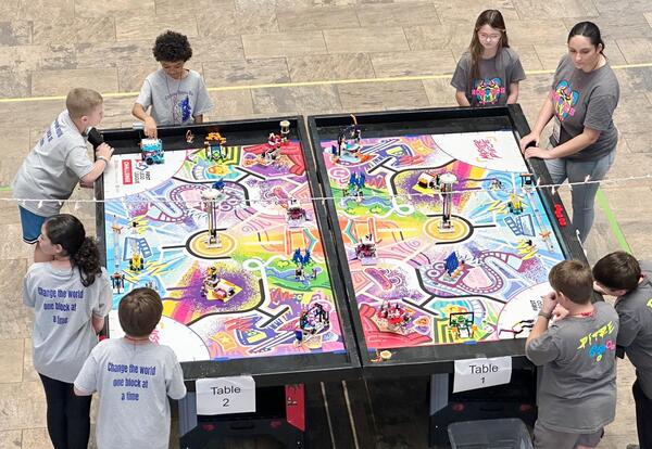 students at lego table