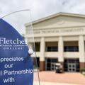 A Fletcher Technical Community College partnership recognition plaque is featured in front of the college’s main campus, symbolizing the strong and growing network of business and industry partnerships supporting workforce development in South Louisiana.