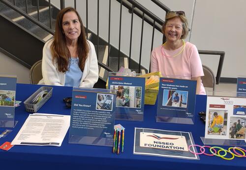 Two of our NSSEO Foundation Members handing out information