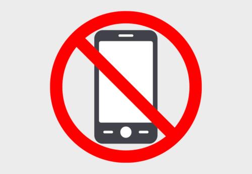 A graphic showing a cell phone with a red striped across it.