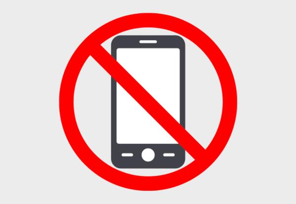 A graphic showing a cell phone with a red striped across it.