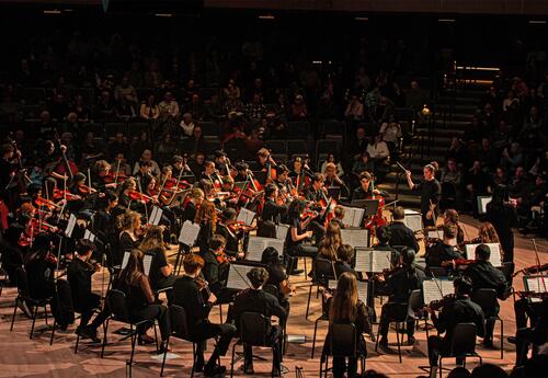The Oyster River High School strings orchestra plays in the Morse Recital Hall.