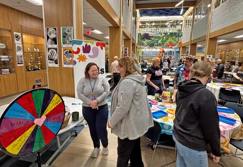 Booths set up in the learning commons during ORMS Humanities Night.